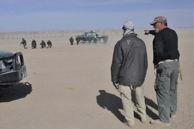 U.S. Soldiers, civilian contractors mentor Afghan Border Police in Spin Boldak