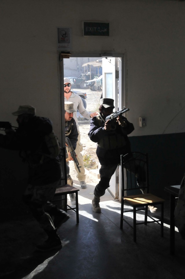 U.S. Soldiers, civilian contractors mentor Afghan Border Police in Spin Boldak