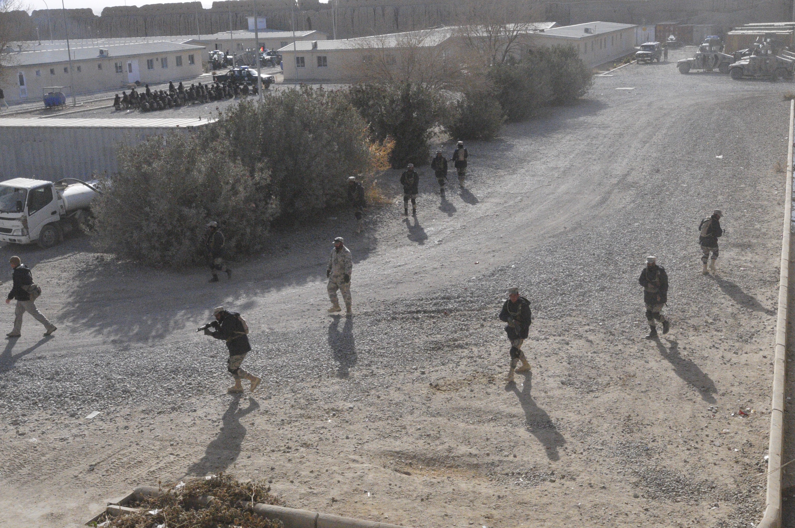 U.S. Soldiers, civilian contractors mentor Afghan Border Police in Spin ...