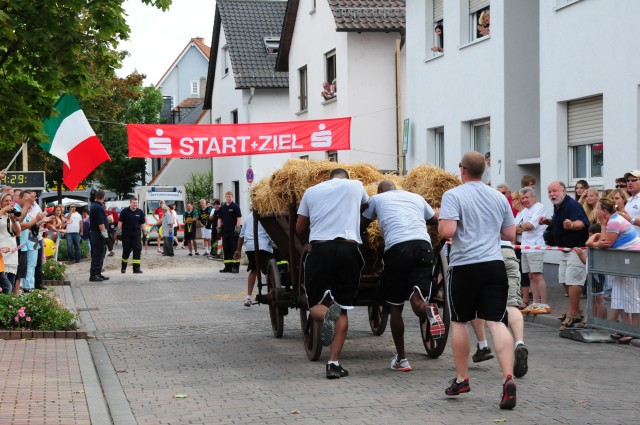 BOSS Soldiers push hay wagon in local contest
