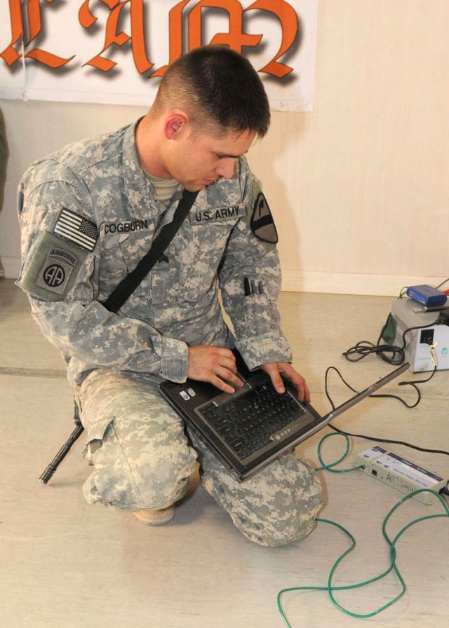 Information systems NCO provides technical support to Cavalry troopers in Iraq