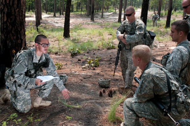 Airborne engineers breach a wire barrier