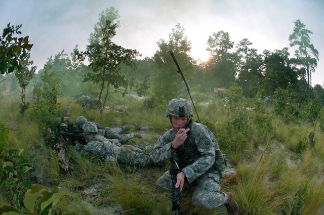 Airborne engineers breach a wire barrier