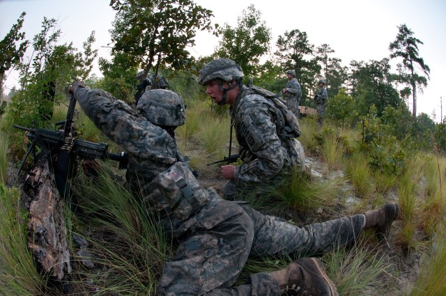 Airborne engineers breach a wire barrier