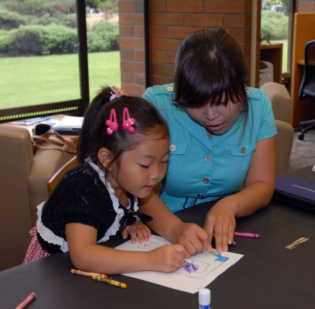 JBLM Children Enjoy Mid-Summer Night’s Read
