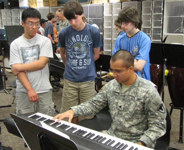 Member Of The Army Materiel Command's 4 Star Jazz Orchestra Teaches A Group Lesson
