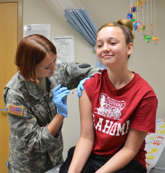 Immunization teen girl getting vaccine