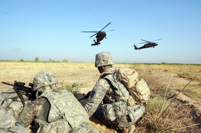 Scouts in Iraq perform airborne missions to uncover weapons caches