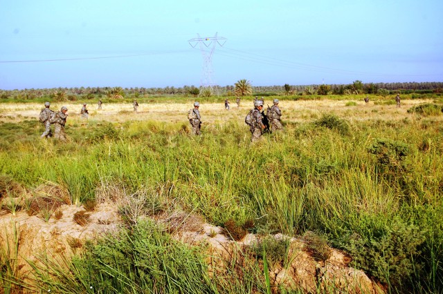 Scouts in Iraq perform airborne missions to uncover weapons caches