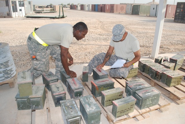 Soldiers at Joint Base Balad, Iraq inventory ammunition.