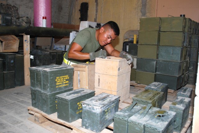 Ammunition specialists with the 8th Ordnance Company sort through turn-in.