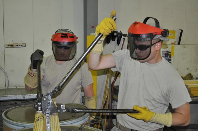 Soldiers prepare ammunition for demilitarization while at CAAA