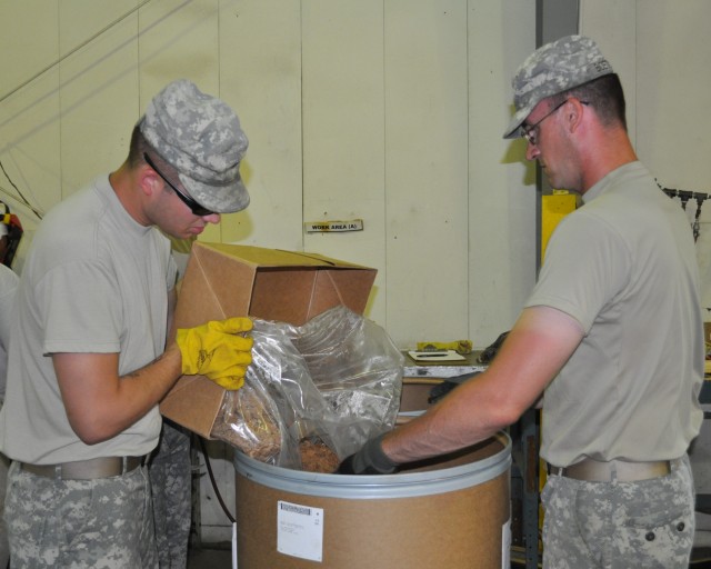 Soldiers prepare ammunition for demilitarization while at CAAA