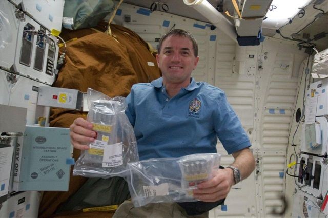 Walheim runs experiments aboard Space Shuttle Atlantis