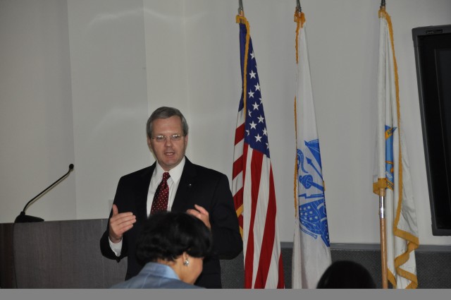 Joseph McDade, Army assistant deputy chief of staff G-1, briefs Army civilians on Civilian Workforce Transformation