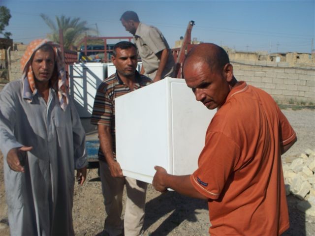 Baghdad-based Soldiers donate goods to local families in need