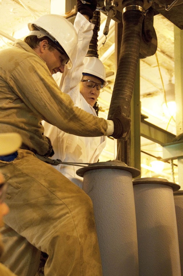 Gen. Ann Dunwoody fills bomb with explosive at McAlester Army Ammunition Plant