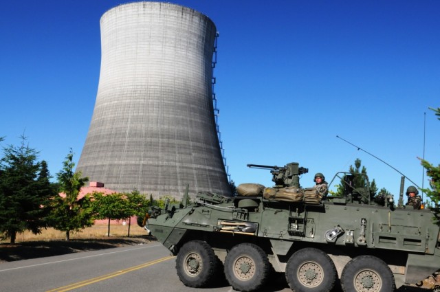 A CBRN reconnaissance vehicle provides security