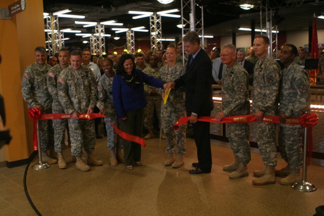 Leaders cut a ribbon signifying opening of the Warrior Zone