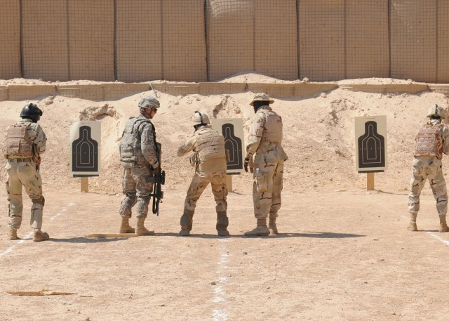 Infantry Soldiers share marksmanship knowledge with Iraqi soldiers