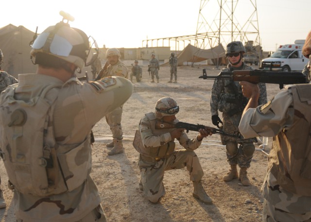 Infantry Soldiers share marksmanship knowledge with Iraqi soldiers