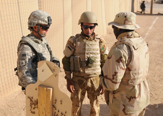 Infantry Soldiers share marksmanship knowledge with Iraqi soldiers