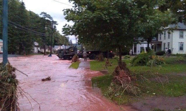 New York Army National Guard Engineers save residents from rising floodwaters.