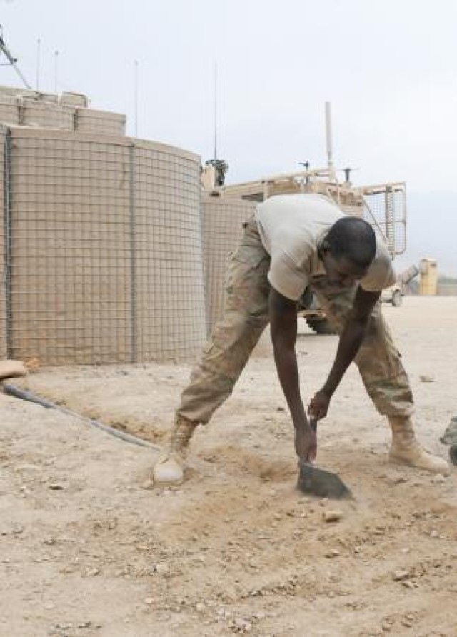 U.S. Army Spc. Oladele Alabi, a multichannel systems operator and maintainer for Headquarters and Headquarters Battery, 5th Battalion 25th Field Artillery, 4th Brigade Combat Team, 10th Mountain Division's Task Force Thunder and native of Los...