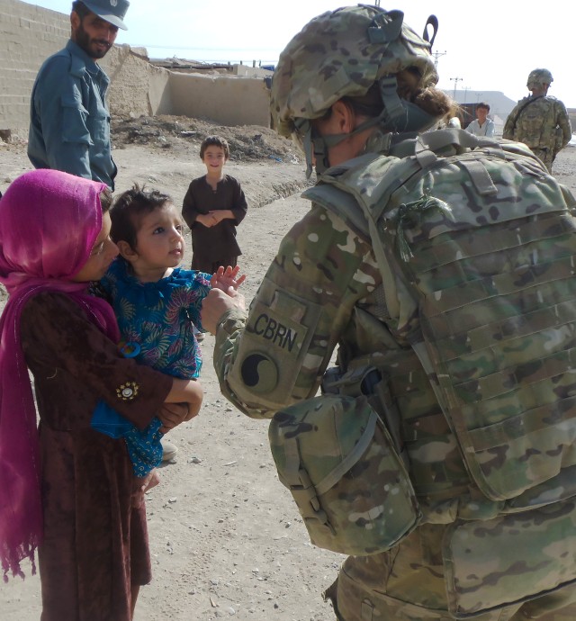 Female engagement team interacts with local citizens