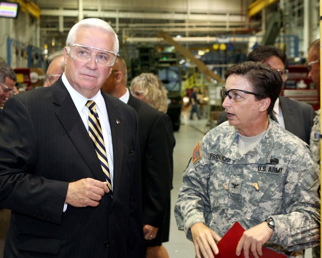 PA Governor Tom Corbett and Col. Cheri Provancha converse during the tour