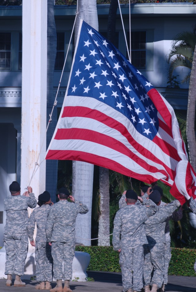 Flag detail salutes American flag