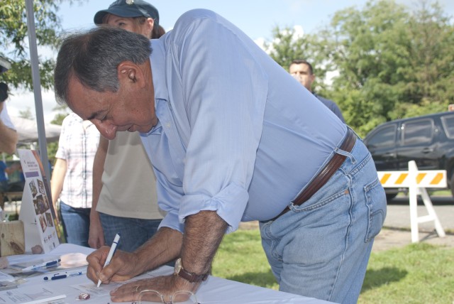 SecDef, volunteers build Fort Meade playground to remember 9/11