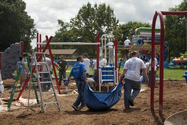 SecDef, volunteers build Fort Meade playground to remember 9/11