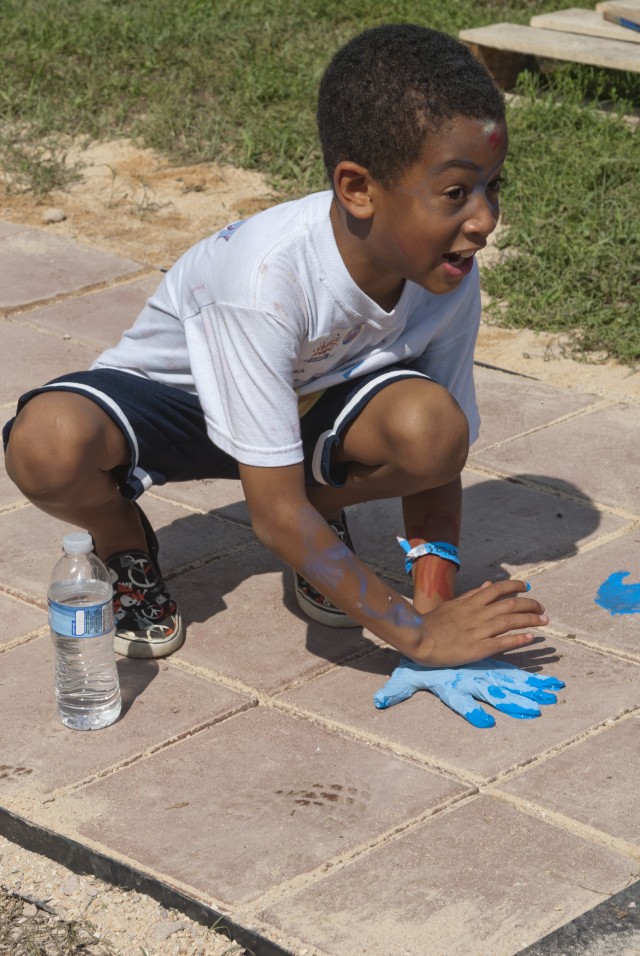 SecDef, volunteers build Fort Meade playground to remember 9/11