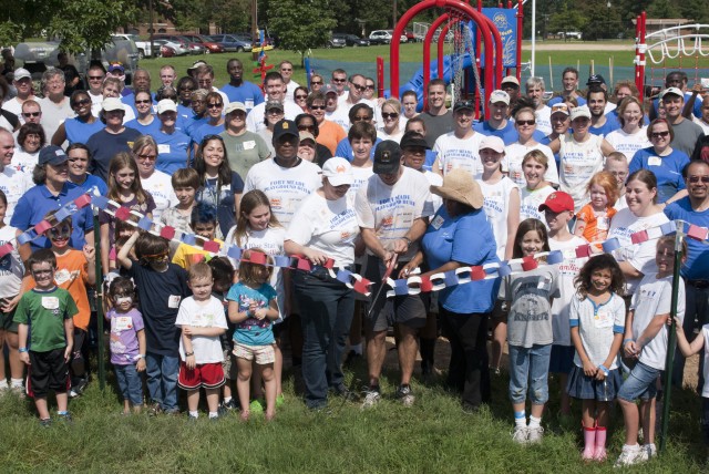 SecDef, volunteers build Fort Meade playground to remember 9/11