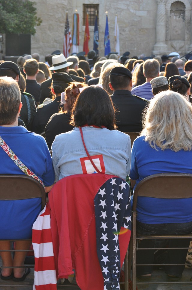 A Blue Star Mother listens during San Antonio's commemoration of the 10-year anniversary of 9/11 at the Alamo Sunday morning.