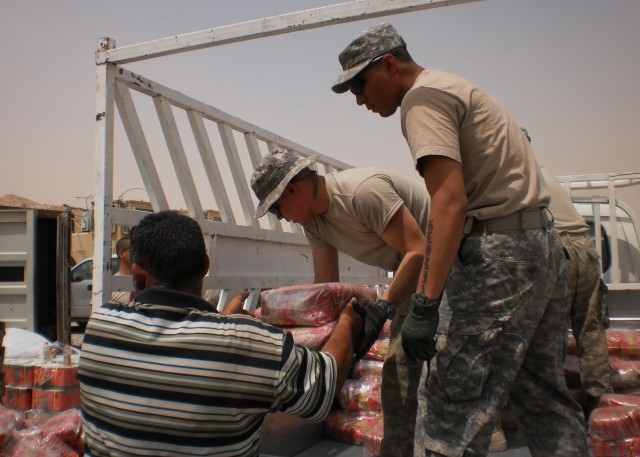 'Dark Horse' troops provide humanitarian aid