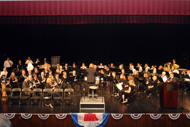 Brig. Gen. Gracus Dunn, Commanding General of the 85th Support Command, conducts "Stars and Stripes Forever"