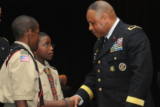 Members of Boy Scout Troop 100 meet and talk with Brig. Gen. Gracus Dunn, Commanding General of the 85th Support Command