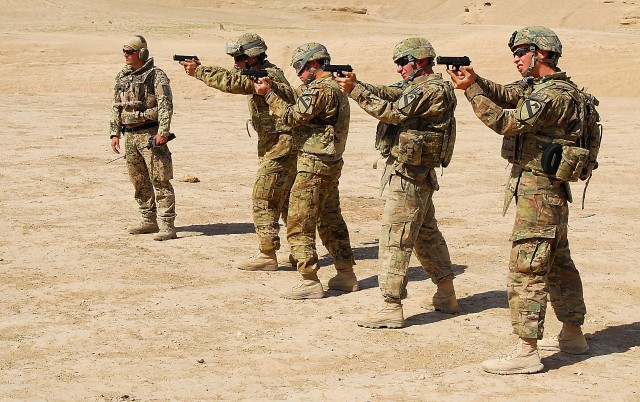 Air Cav troopers take aim with German firepower during small arms range