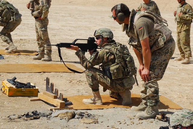 Air cav troopers take aim with German firepower during small arms range ...