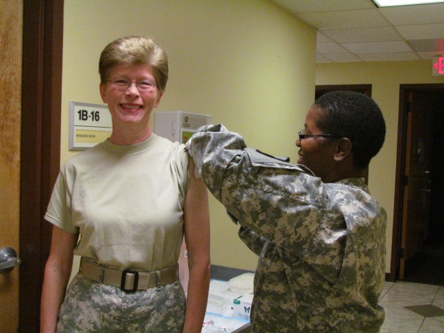Col. Elizabeth Johnson Receives Her Flu Shot