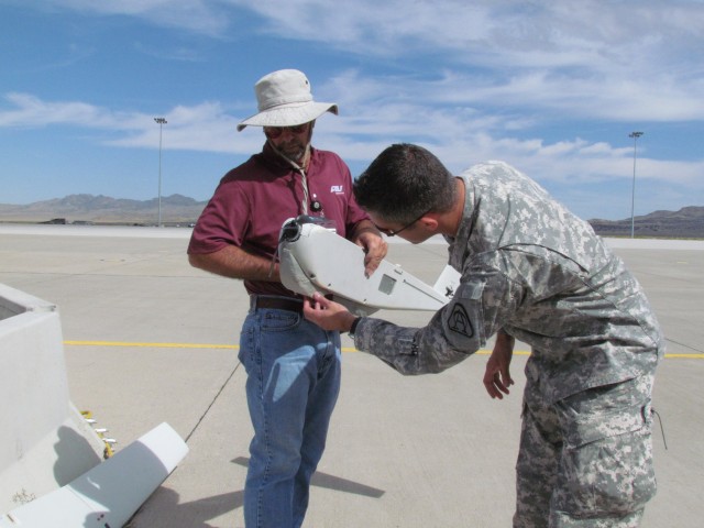 Maj. Jeff Poquette Inspection A Puma After A Landing