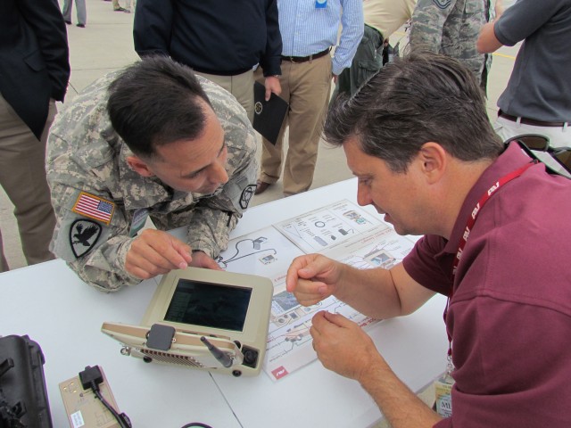 Lt. Col Nick Kioutas Talks With Mike Mushovic About The Operation Of The New Mini-Universal Ground Control System