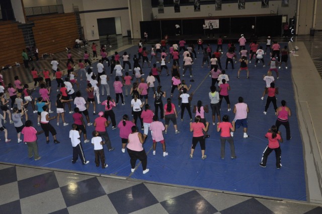 Painting the post pink? Community breaks a sweat for breast cancer awareness