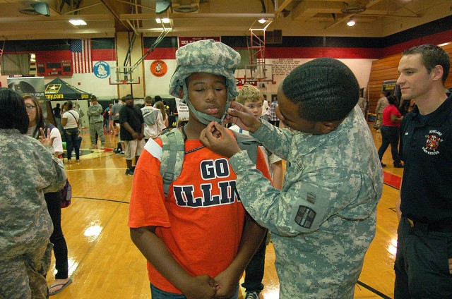 Student Dons a Soldier's Headgear