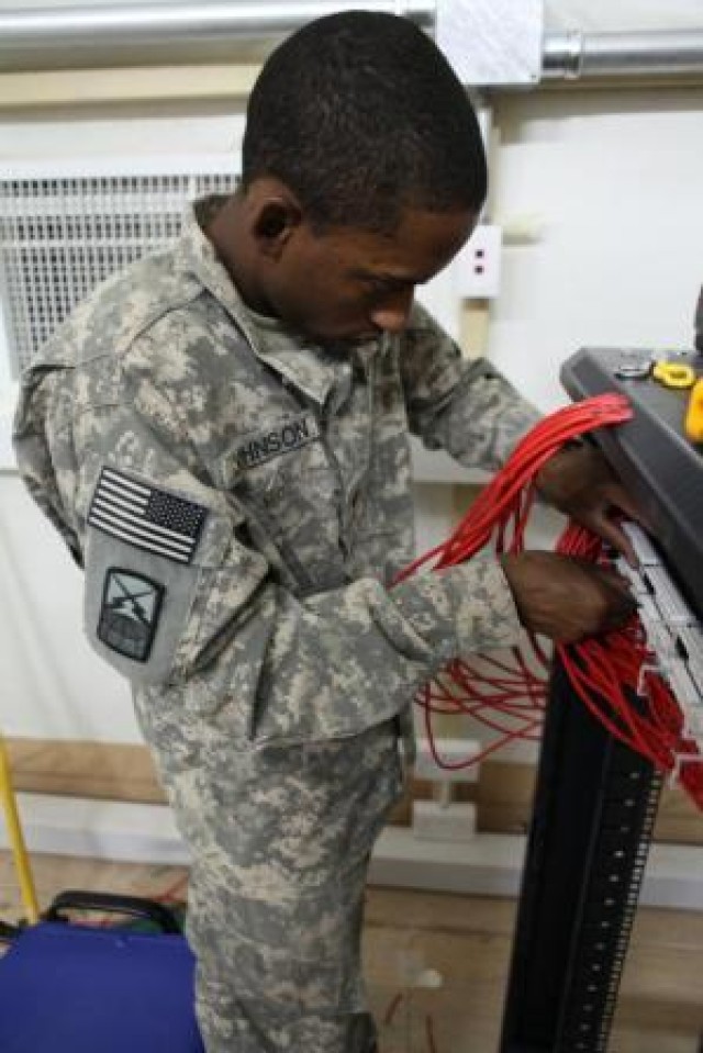 820th Signal Company Soldier Terminates Cables