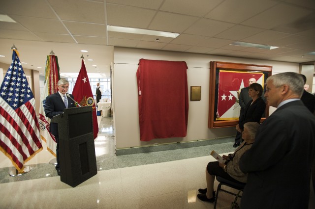 Secretary of the Army gives remarks during Casey portrait unveiling