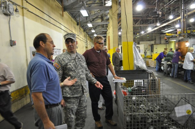 Perna visits Iowa ammunition plant production line