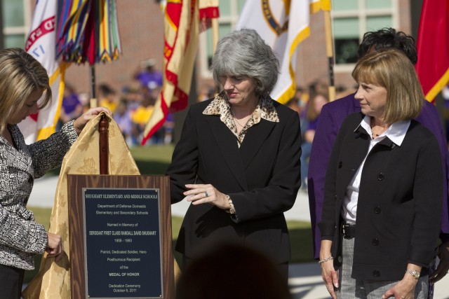 Plaque unveiling at Shughart Schools dedication